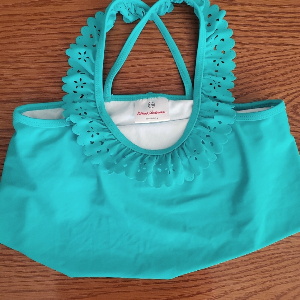 Two pc. Hanna Andersson flouncing top and swim skirt. Girl 130      (US 8).